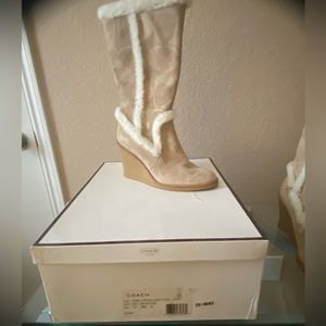 Coach boots size 7.